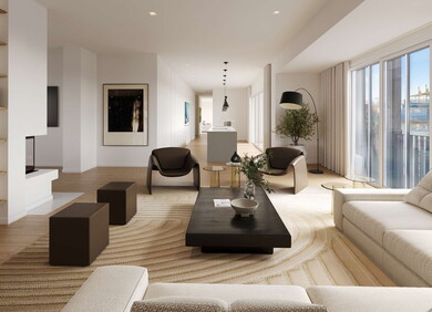 Lichtdurchfluteter Wohn- und Essbereich mit Designküche